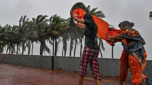 Authentic publisher wire photograph: Visakhapatnam Paralyzed by Cyclone Arnab as Intense Rain and 100 Kmph Winds Batter Coast