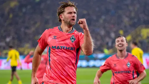 Authentic publisher wire photograph: Füllkrug Stuns Dortmund With Cup Brace to Keep Historic Record in Sight