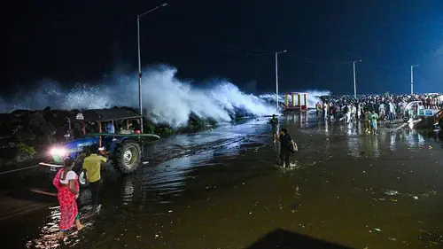 Authentic publisher wire photograph: Severe Storm Arnab Nears Andhra Coast: Transit Halted and One Dead