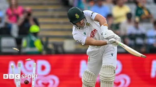 Authentic publisher wire photograph: Starc Snags Six as Australia Stuns Proteas with Late Day 1 Collapse