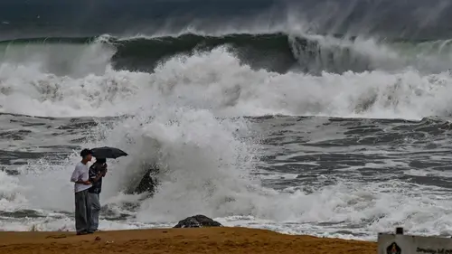 Authentic publisher wire photograph: Severe Storm Arnab Hits Coastal Andhra Pradesh: 1 Dead in Visakhapatnam