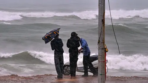 Authentic publisher wire photograph: Andhra Braces for Cyclone Arnab: Highest Port Warning Hoisted as Winds Reach 140 Kmph